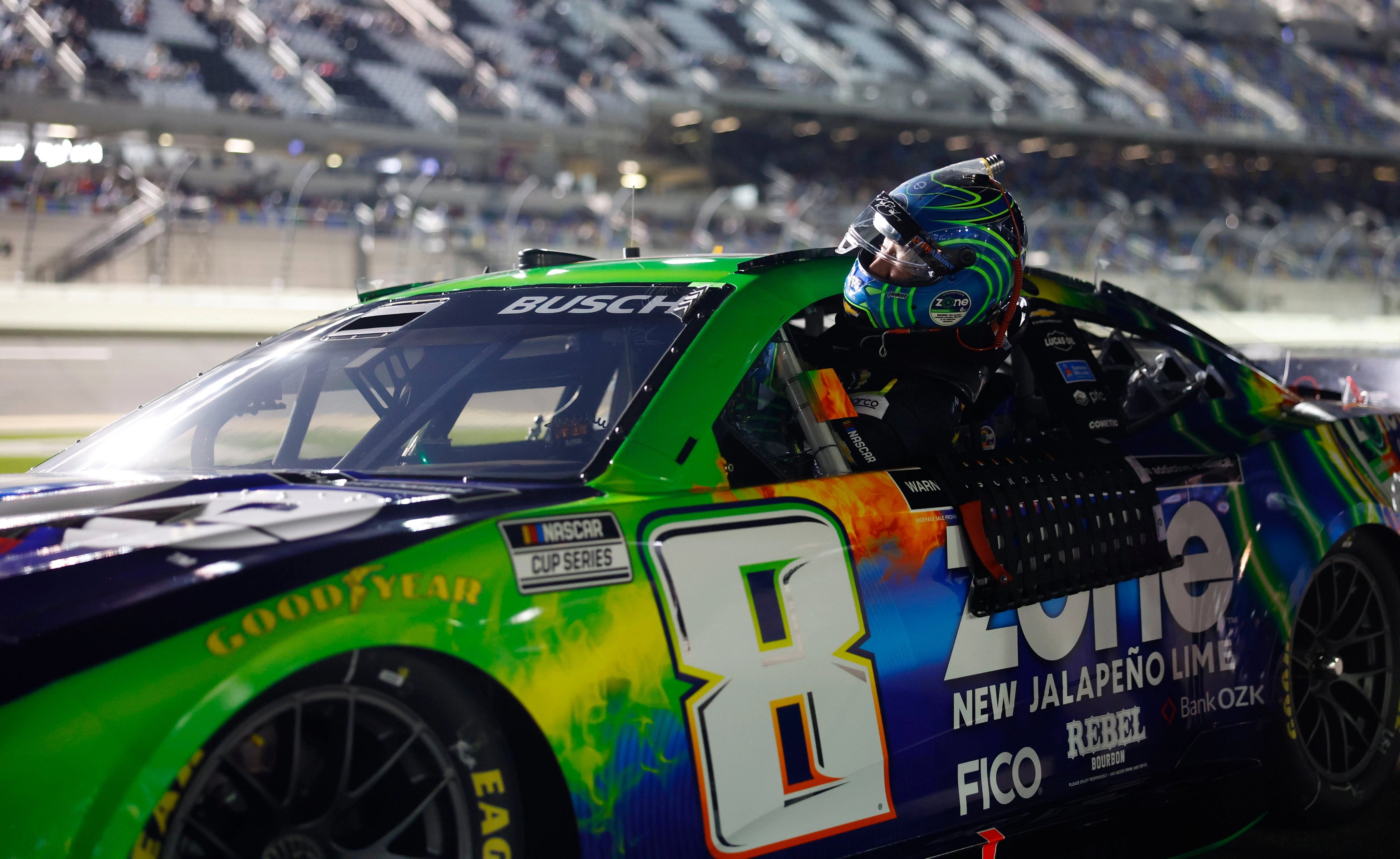 Kyle Busch sticking head out of the car